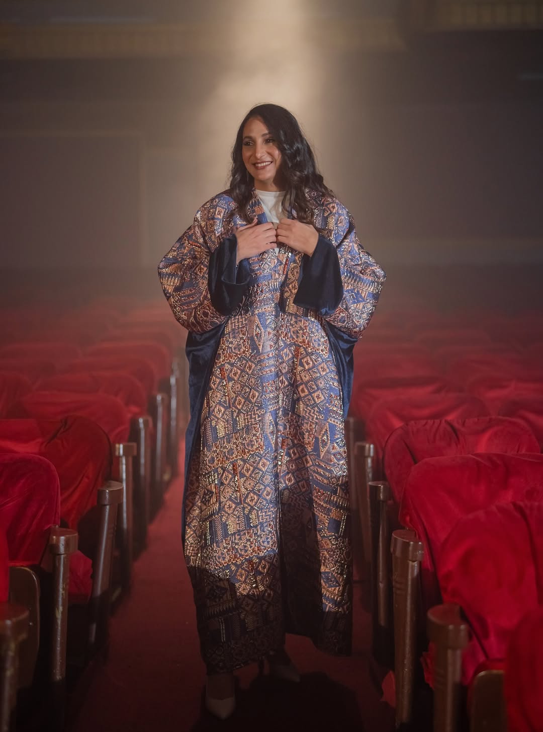 Jacquard Brocade Abaya in theatre setting