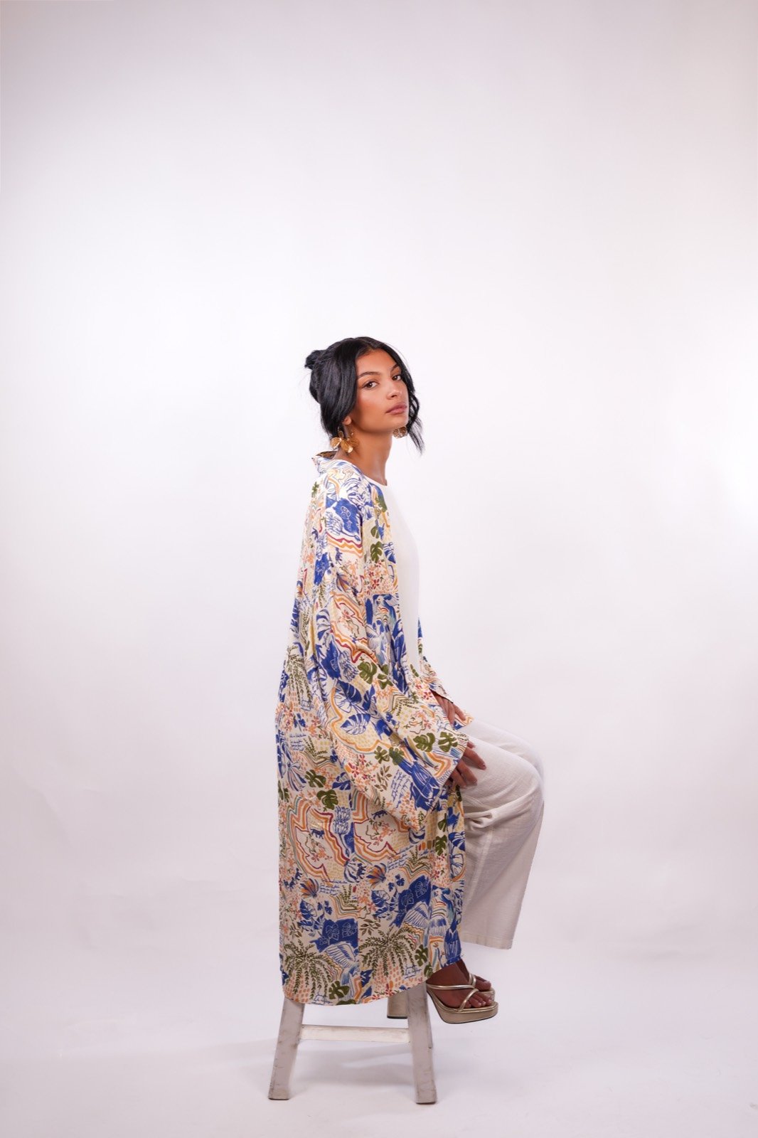 Azure Eden open-front robe in cream with blue floral print, turned to show the back, from the Le Kanz summer collection