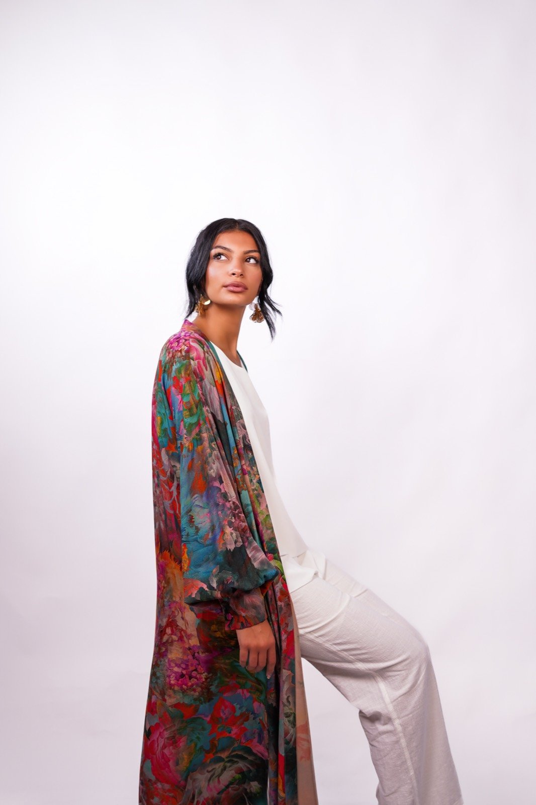 Tropical Muse open-front robe in a multicoloured painterly print, standing, full length, from the Le Kanz summer collection