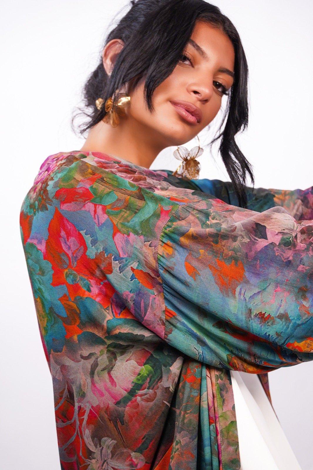 Tropical Muse open-front robe in a multicoloured painterly print, close view of the printed sleeve, from the Le Kanz summer collection