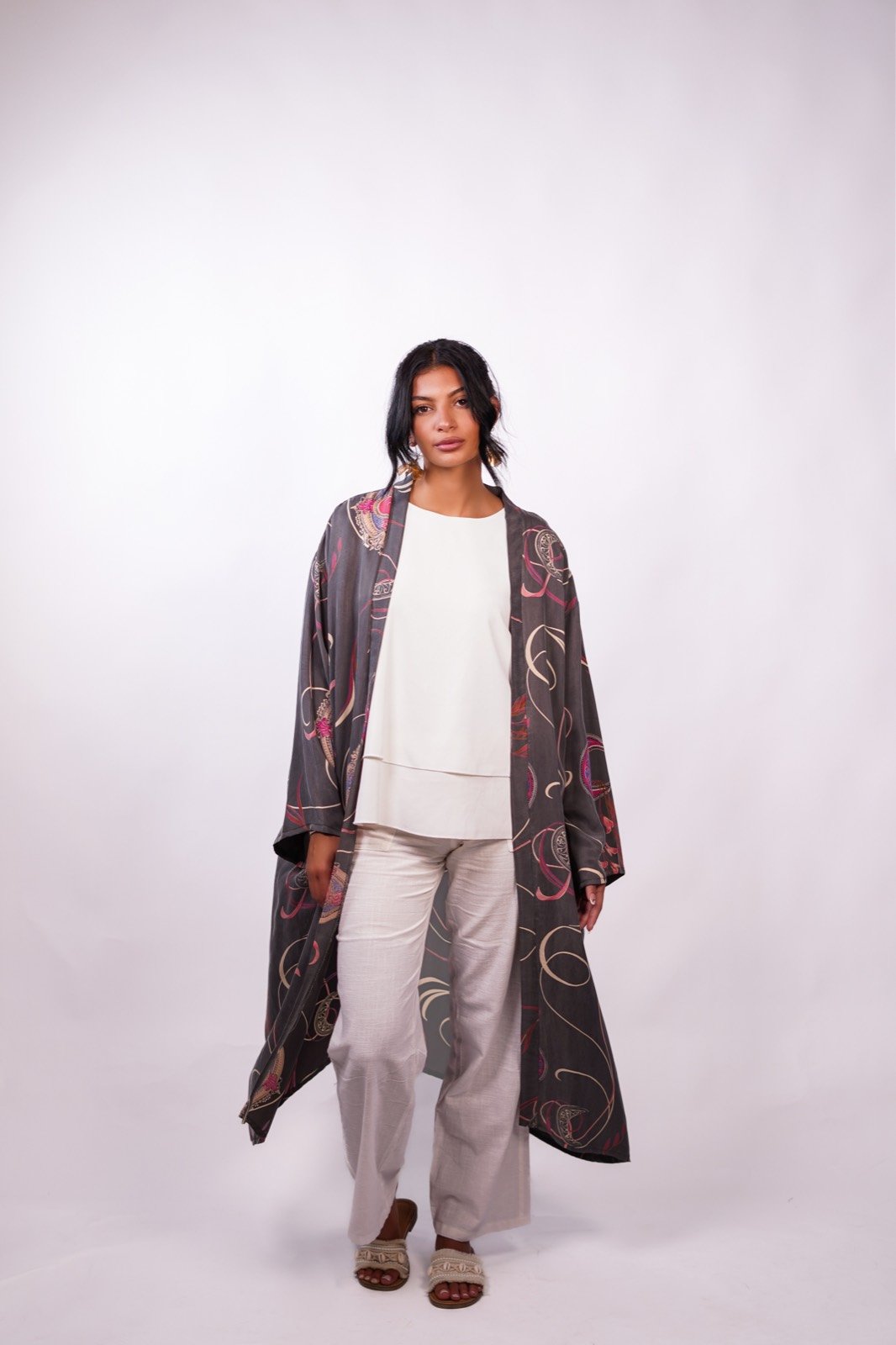 Midnight open-front robe in charcoal with a swirling print, standing, full length, from the Le Kanz summer collection